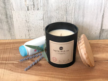 Load image into Gallery viewer, Innocence Soy Wax Candle | 13oz Matte Black Glass Jar with Wooden Lid
